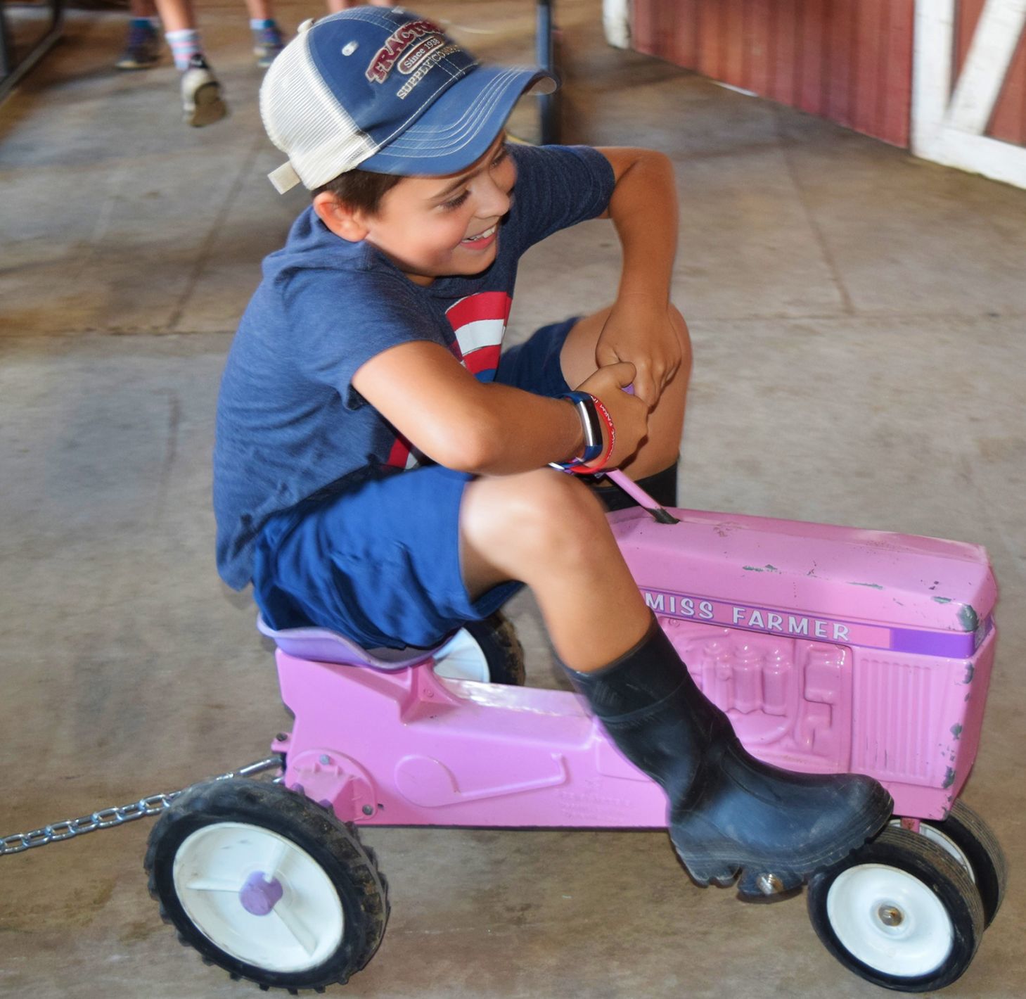Cooper Davis in toy-tractor pull